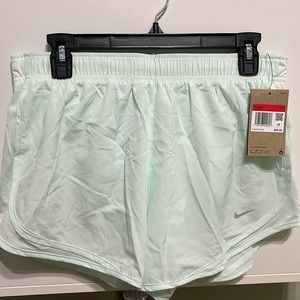 Women’s Nike dri-fit tempo shorts size large. Mint green color